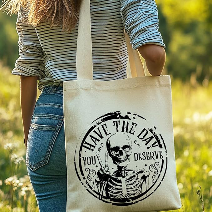 ANATTASOUL Halloween Canvas Tote Bag Black Skull Circle Reusable Cotton Bag for Women, Durable Cloth Shoulder Bags with Zipper Pockets for Shopping, Vacation, Work, Gym